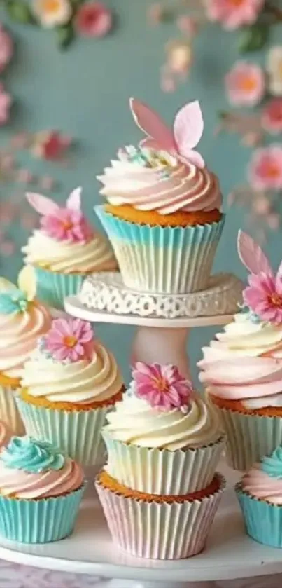 Colorful cupcakes with pastel frosting and floral designs.