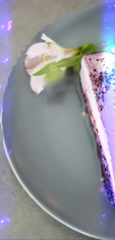 Slice of pastel cake on light blue plate with floral accents.