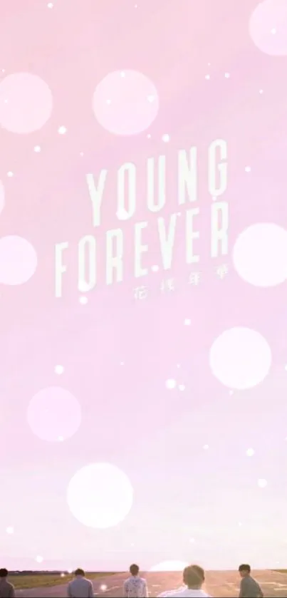 Pastel pink mobile wallpaper with 'Young Forever' text