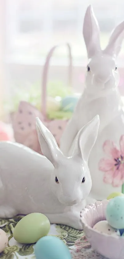 Ceramic bunnies with pastel Easter eggs on a floral tablecloth.