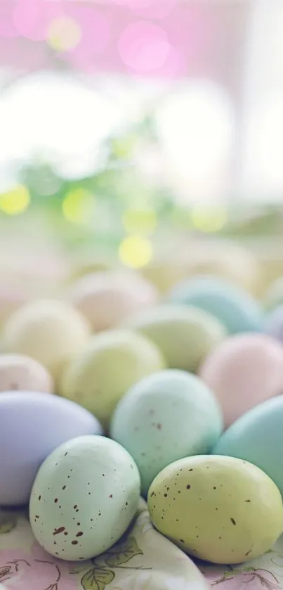 Pastel-colored speckled Easter eggs on a soft floral background.