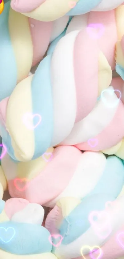 Colorful pastel marshmallows with heart emoji in a playful wallpaper design.