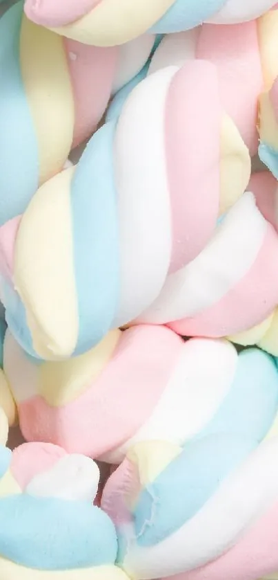 Soft pastel marshmallow swirls with pink, blue, and yellow shades.