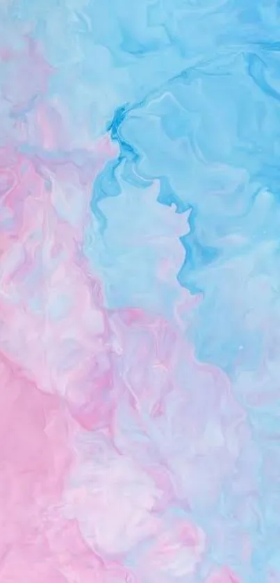 Abstract pastel pink and blue cloud-like wallpaper.