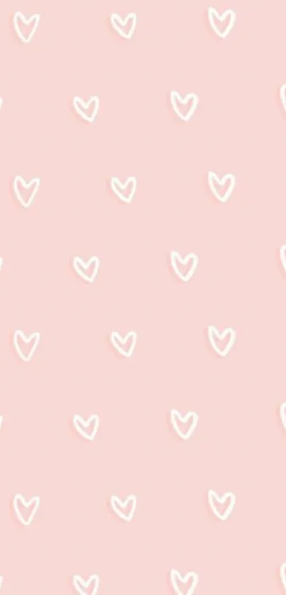 Pastel pink wallpaper with white hearts.