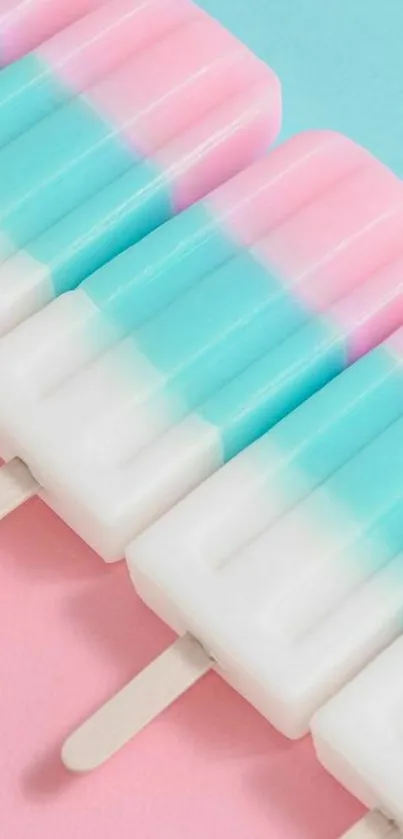 Pastel popsicle wallpaper with pink and blue hues.