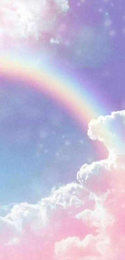 Pastel rainbow over fluffy clouds in a serene sky.