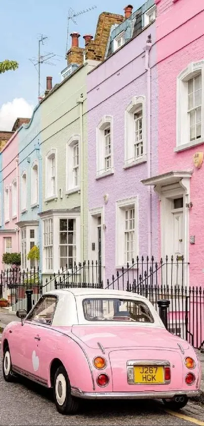 Mobile wallpaper of a pastel street with a vintage pink car.