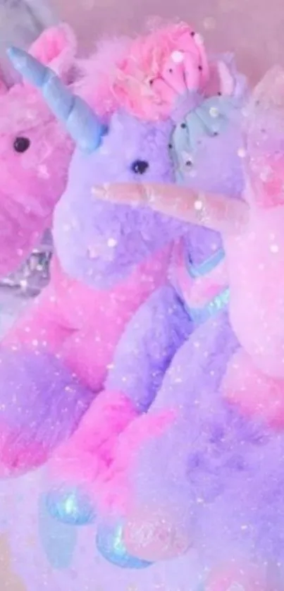 Cute pastel unicorn plush toys with sparkles.