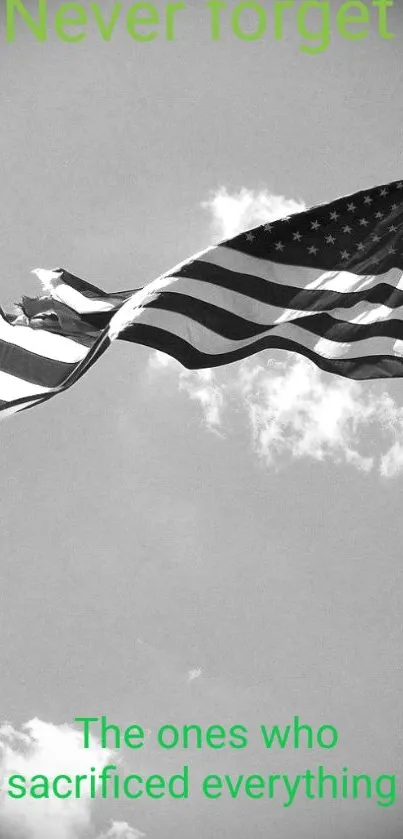 Grayscale image of American flag with green text tribute.