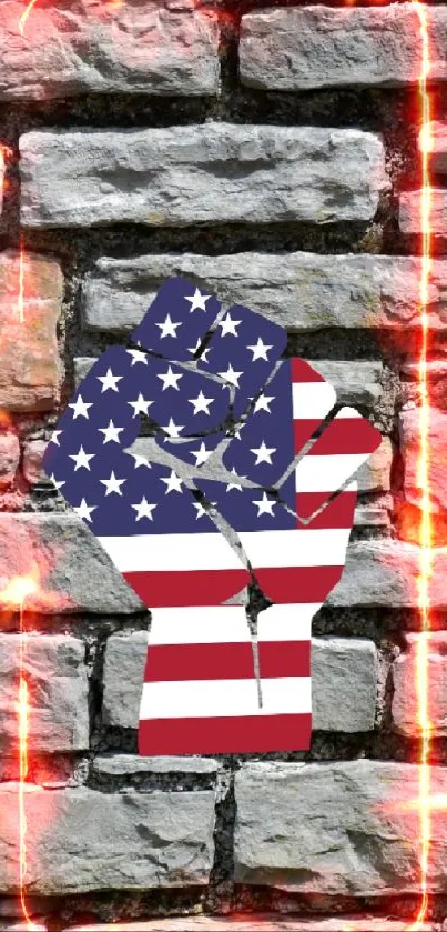 American flag fist on rustic stone wall background.