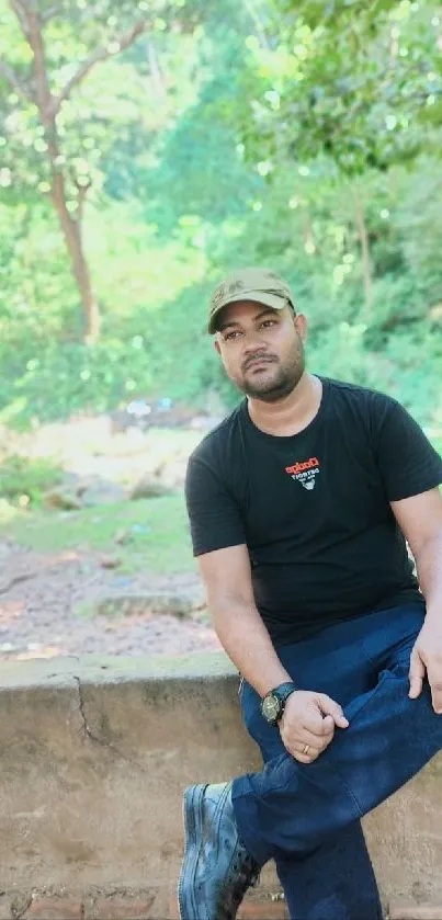 A person sitting in a lush green forest setting, reflecting tranquility.