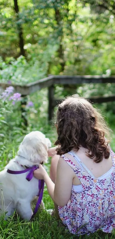 Child and puppy on a peaceful, green forest path with lush surroundings.