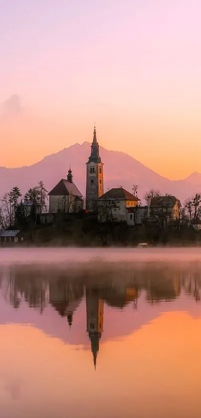 Church reflecting on a tranquil lake during a pastel sunset.