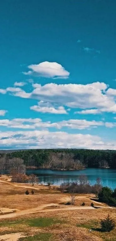 Peaceful landscape with lake and blue sky on mobile wallpaper.