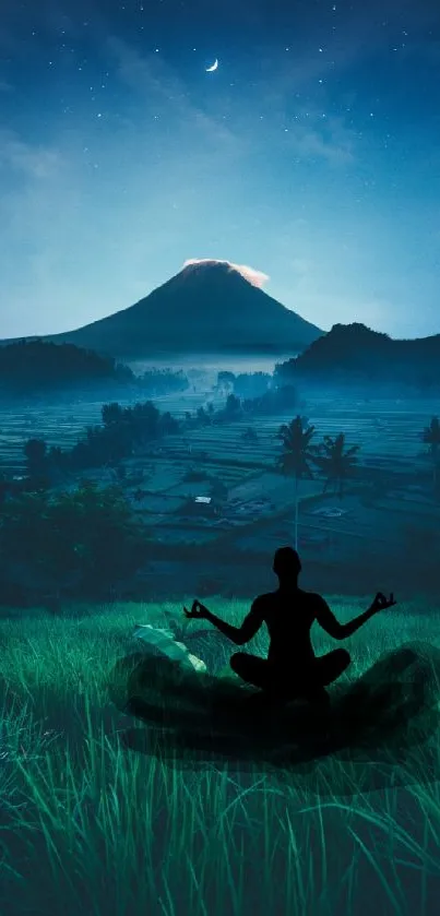 Silhouette meditating with mountain backdrop under a starry night sky.