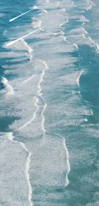 Turquoise ocean waves gently lapping onto the sandy shore.