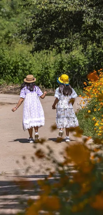 Two children walk down a flower-lined path in a lush green landscape.