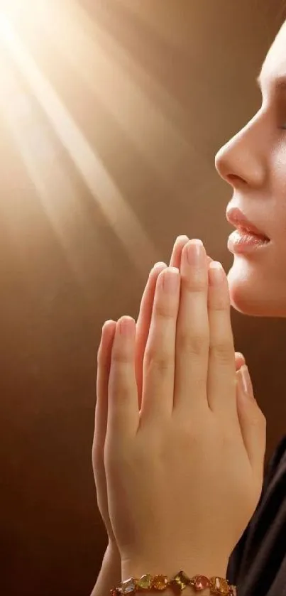 Serene silhouette in prayer with golden light background