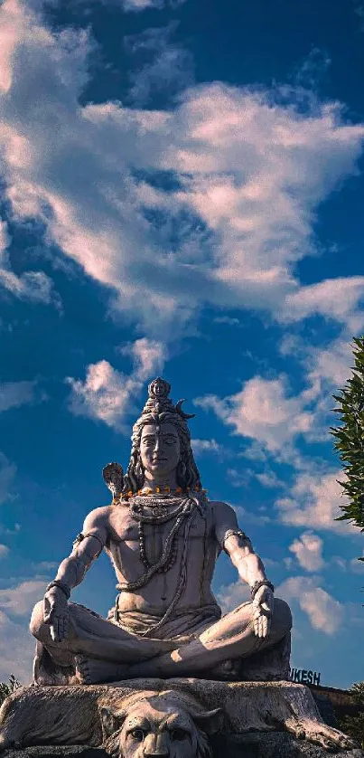 Shiva statue with blue sky and clouds mobile wallpaper