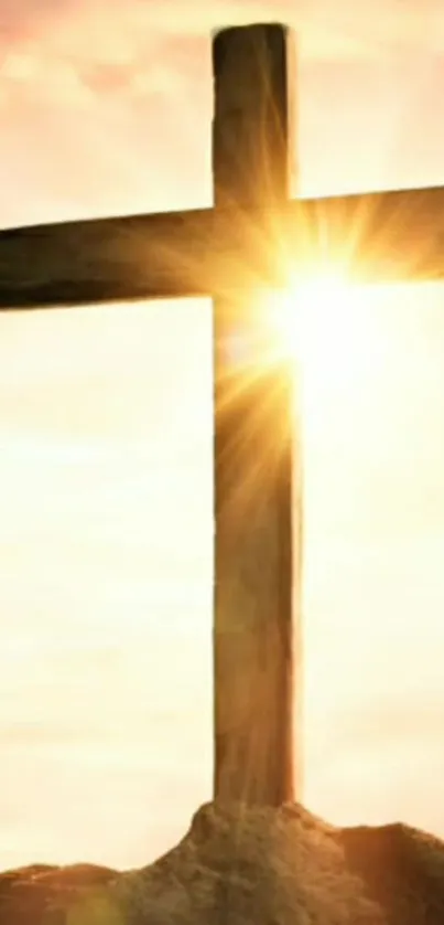 Sunlit cross with a peaceful sunrise in the background.