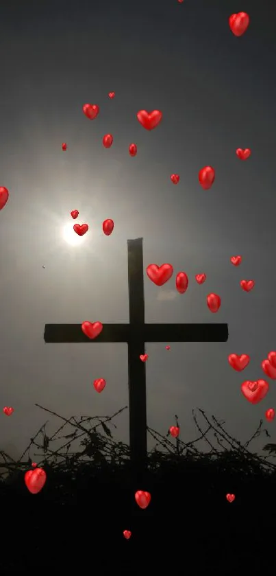 Cross silhouette against a sunset sky, perfect peaceful wallpaper.
