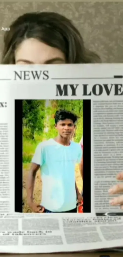 Person holding personalized newspaper-style wallpaper.