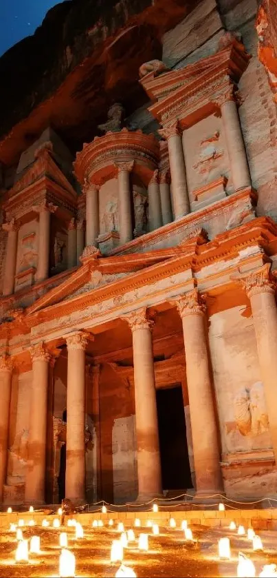 Petra illuminated by candlelight at night.