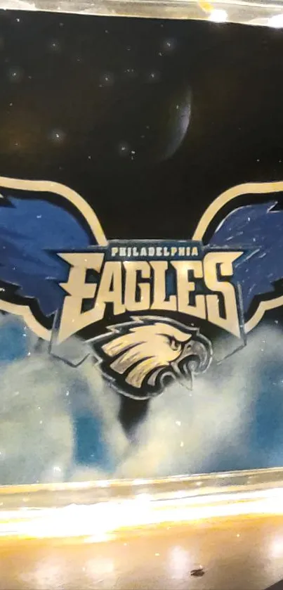 Philadelphia Eagles logo on dark blue cloudy background.