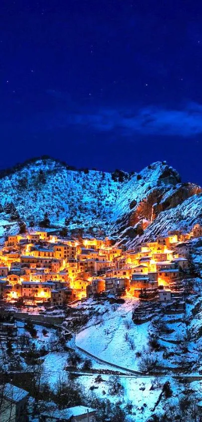 Snowy mountain village illuminated by warm golden lights at night.