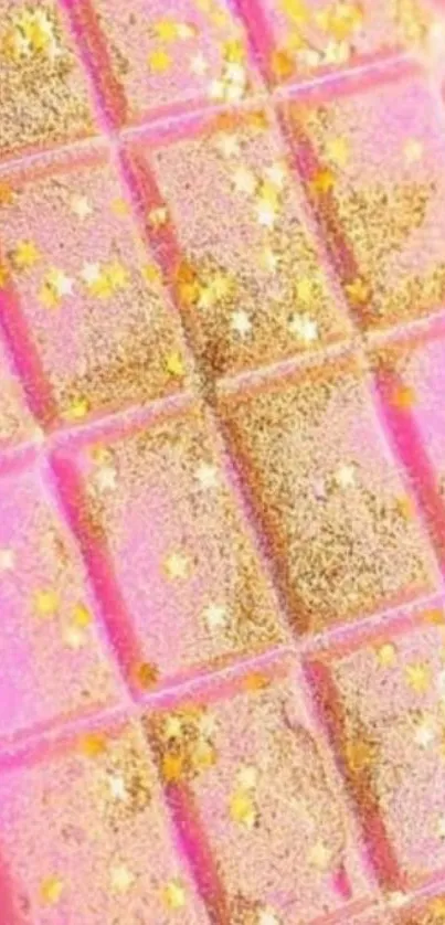 Pink chocolate bar with gold glitter highlights.