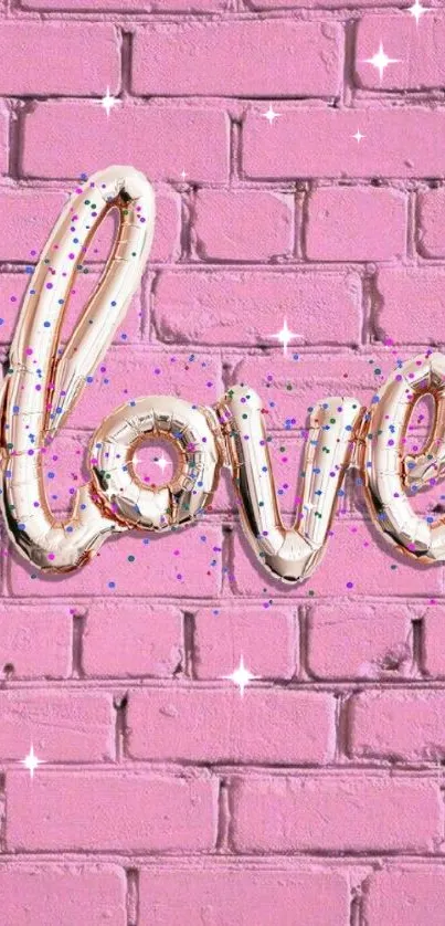 Love balloon script on pink brick wall with confetti.