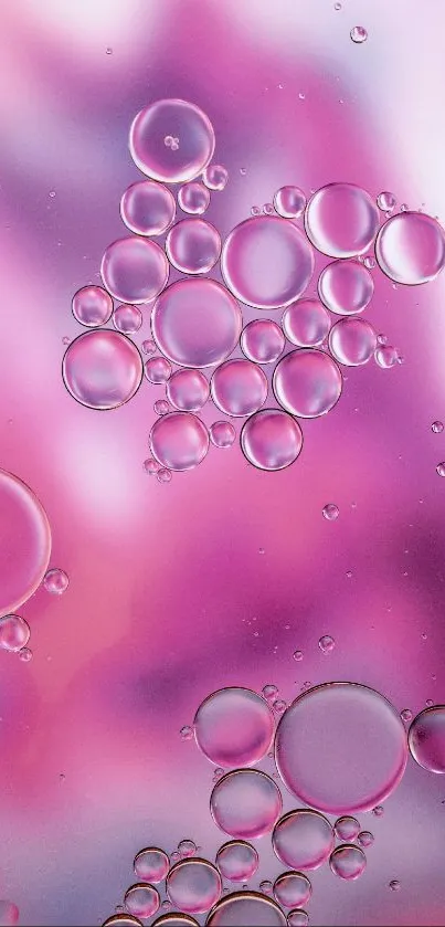 Pink bubble-themed wallpaper with abstract design.