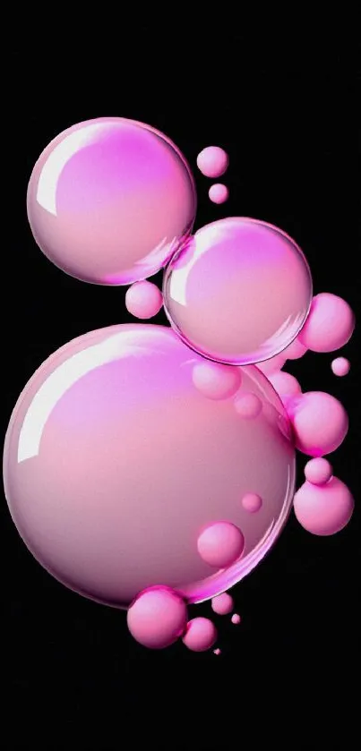 Glossy pink bubbles on black background wallpaper.