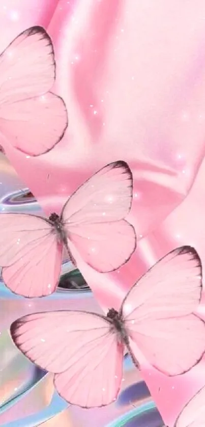 Pink butterflies on pastel pink silk background with iridescent highlights.