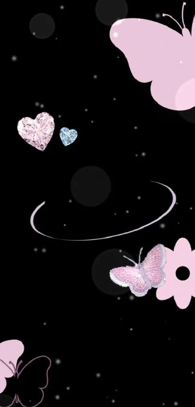 Pink butterfly and heart design on a black background wallpaper.