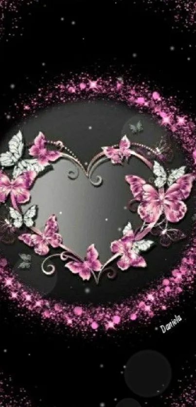 Elegant pink butterfly heart design wallpaper on a black background.