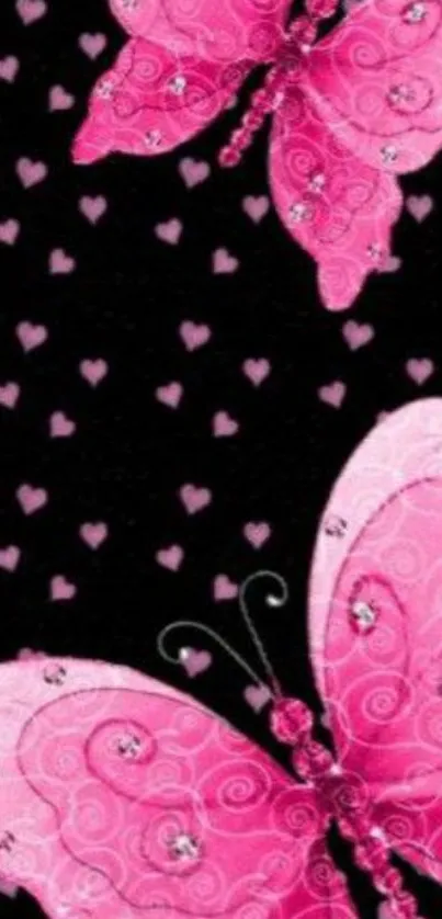 Pink butterfly wallpaper with hearts on black background.