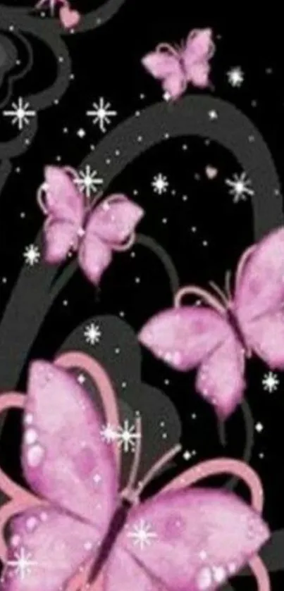 Pink butterflies on dark background with stars.