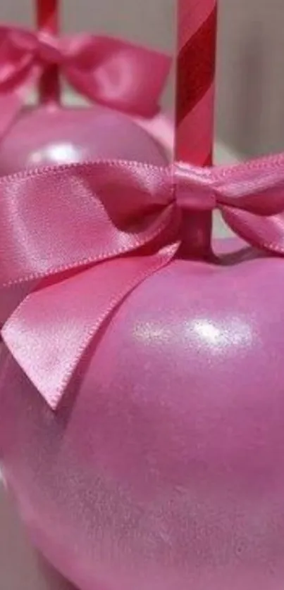 Pink candy apple with ribbon, perfect for mobiles.