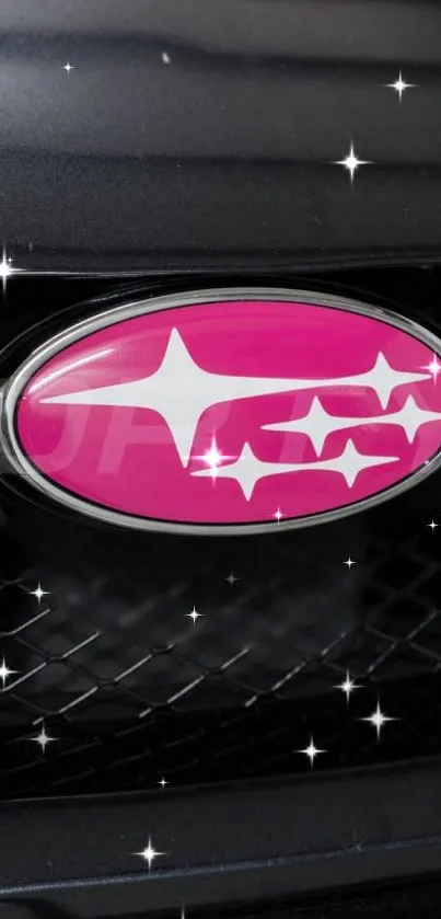 Pink car emblem with stars on a black grille background.