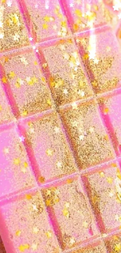 Pink chocolate bar with gold glitter and star accents.