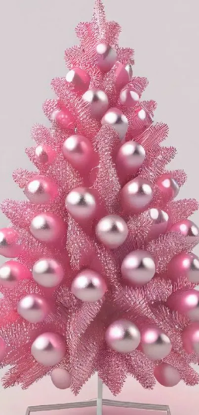 Pastel pink Christmas tree with metallic ornaments mobile wallpaper.