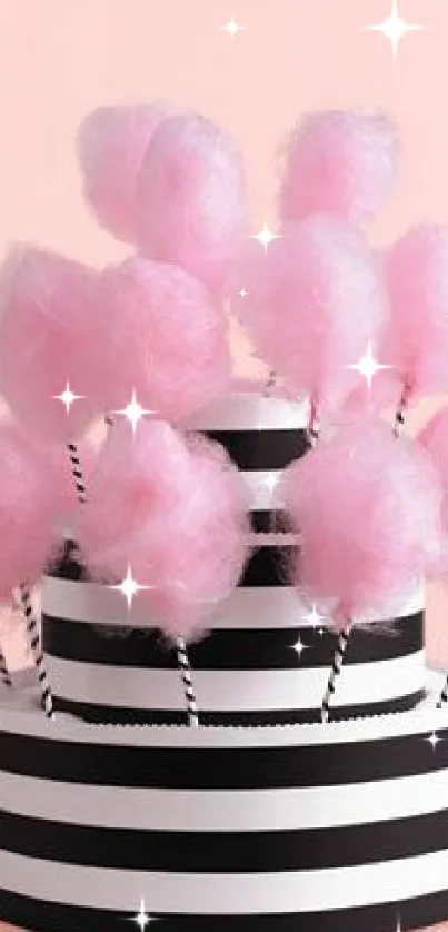 Pink cotton candy pops with black and white stripes.