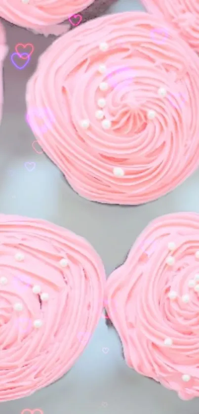 Pink cupcake wallpaper with swirled frosting and pastel accents.