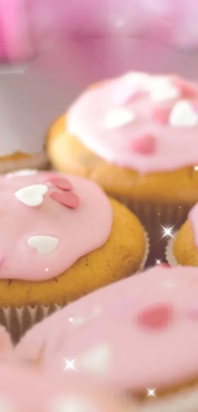 Cupcake wallpaper with pink icing and heart sprinkles.