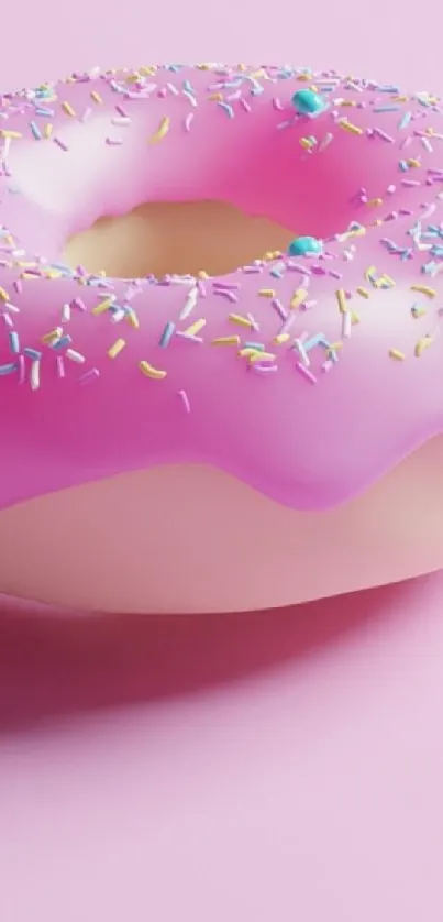 Pink donut with sprinkles on a pastel background.