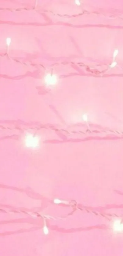 Pink wallpaper with fairy lights glowing softly.