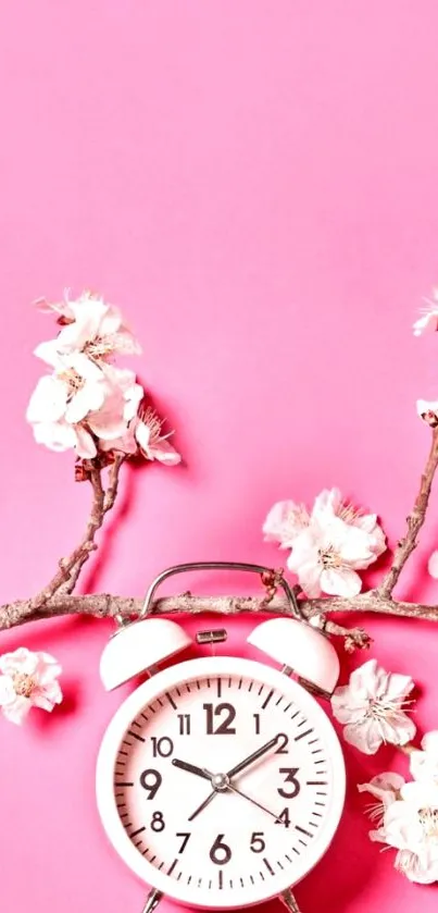 Pink background with white flowers and a classic clock on branches.