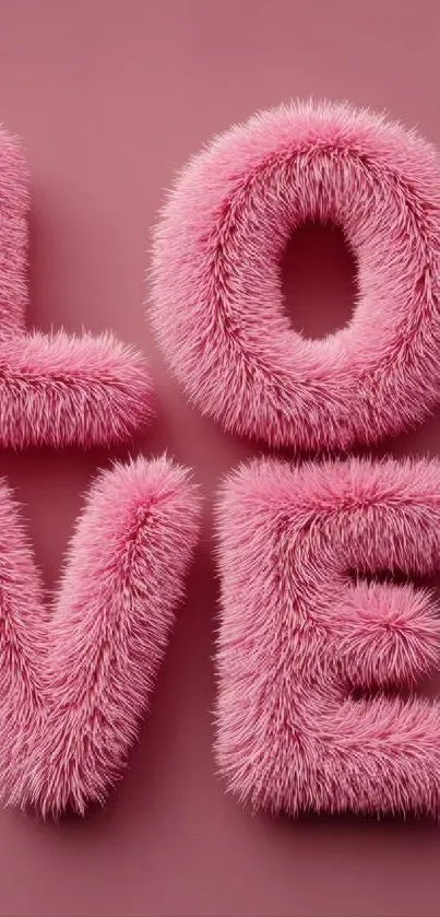 Fluffy pink letters spelling 'LOVE' on a mauve background.